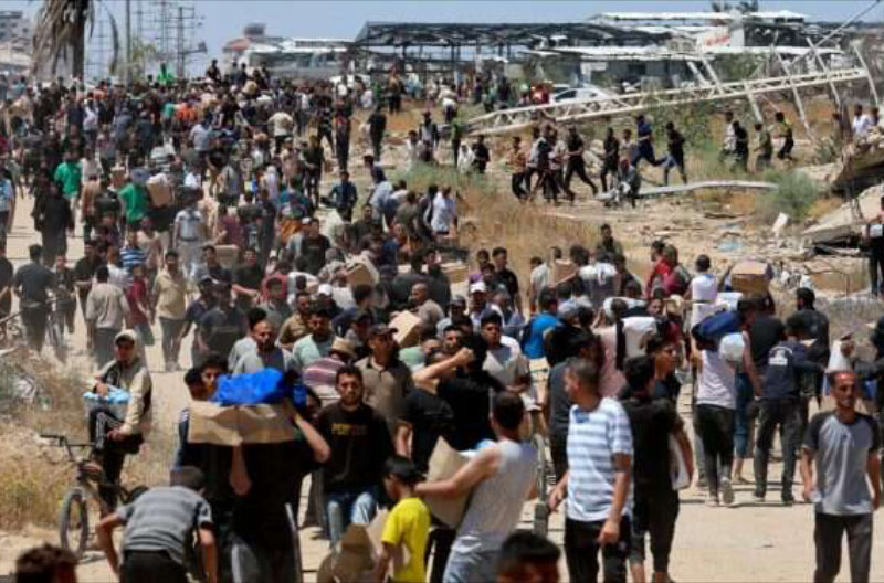 Palestinos-recibiendo-comida-de-GHF-Reuters alimentos
